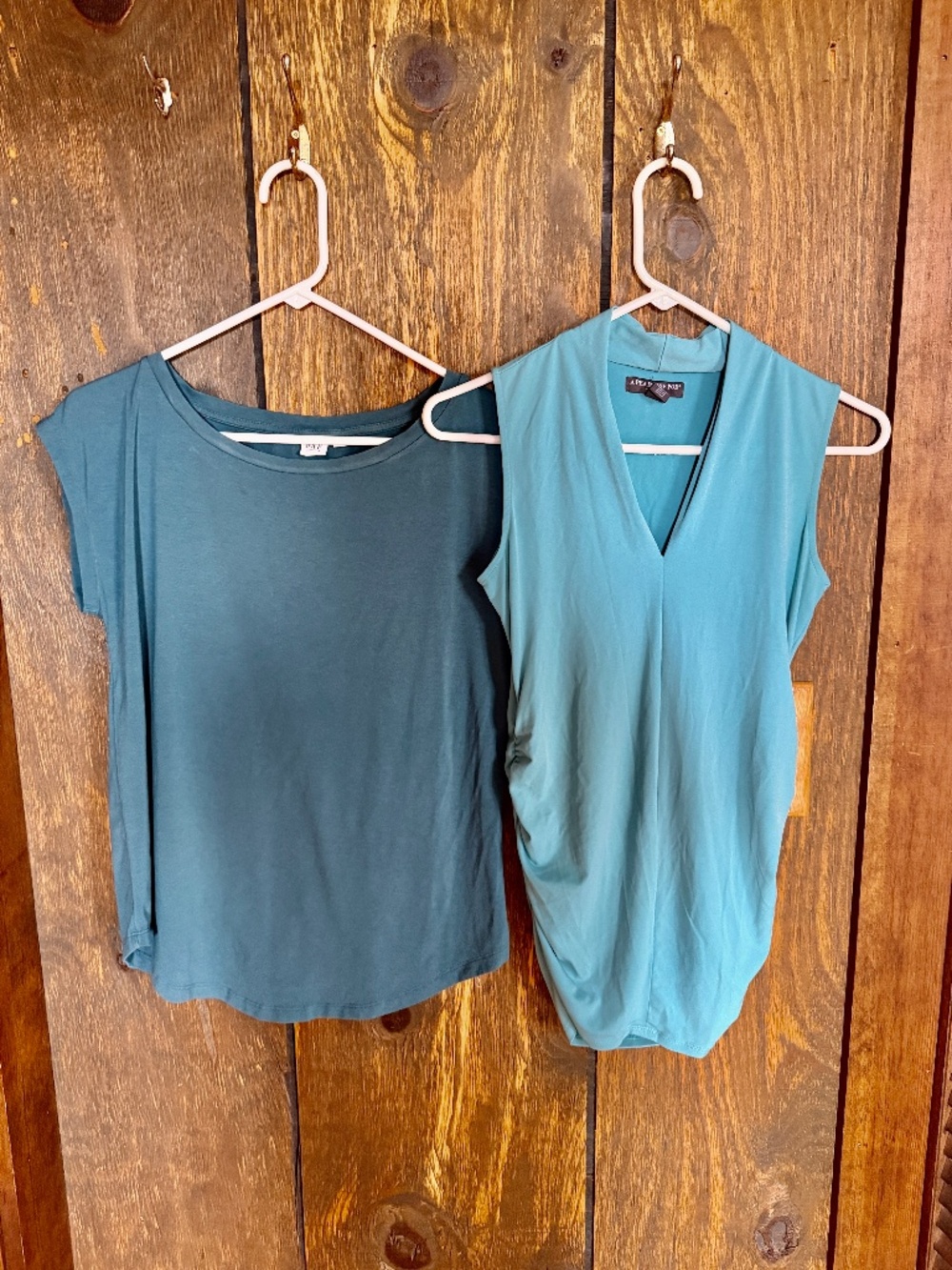 A Pea in the Pod and Gap teal color maternity tops.Size small.